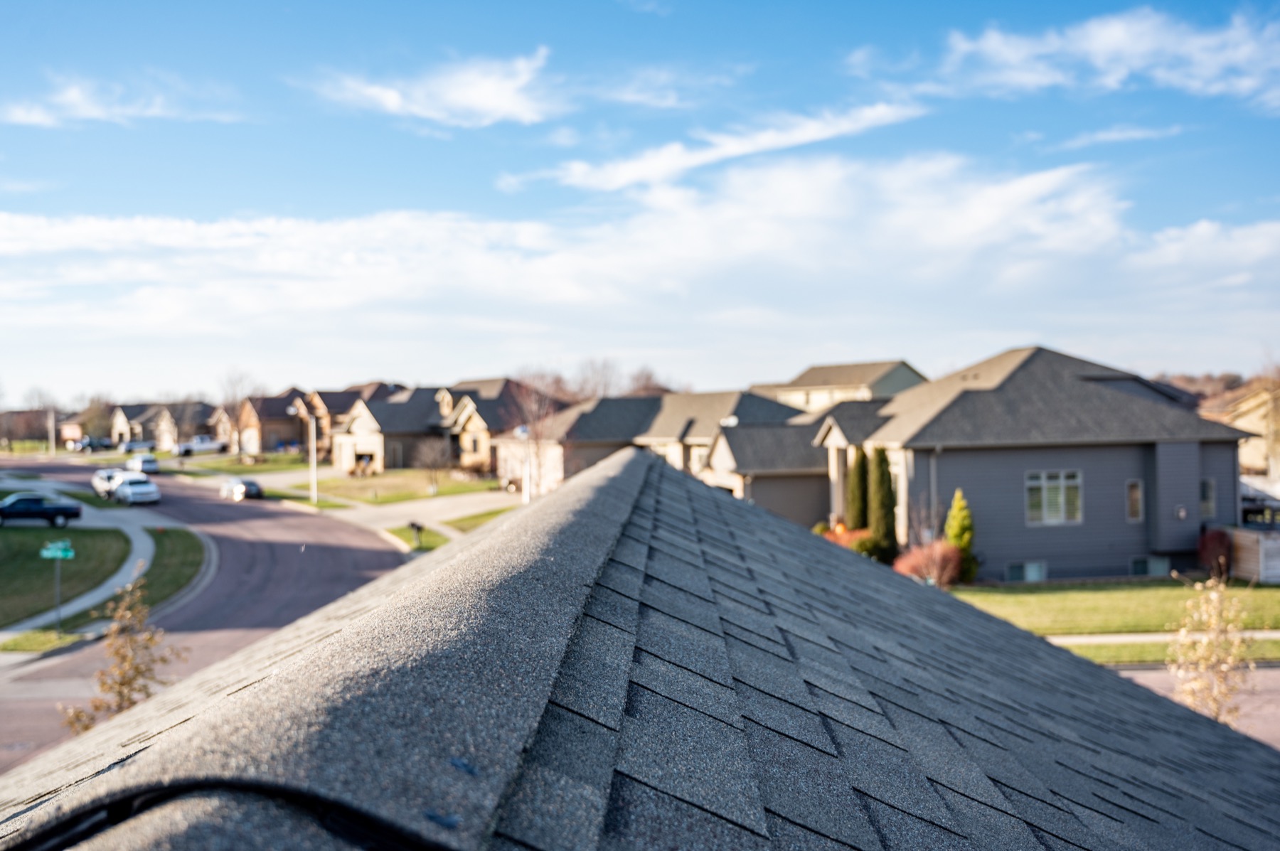 Roofline closeup showcasing installed shingles